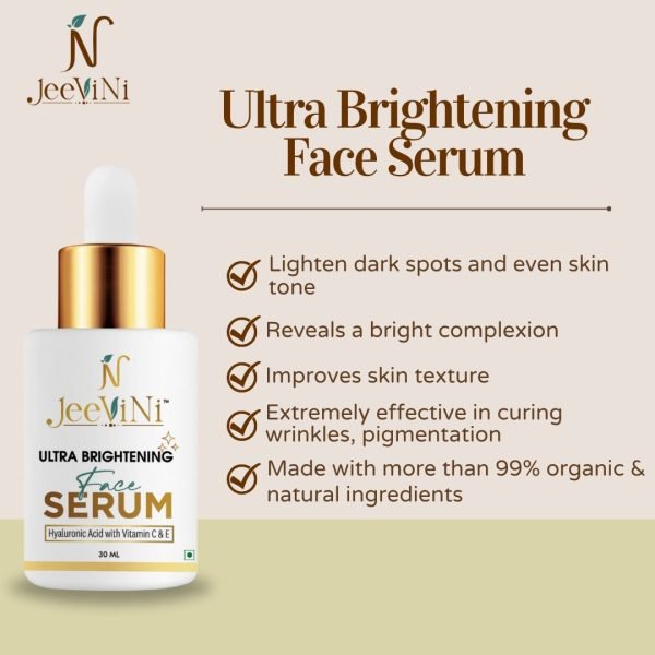 A bottle of JeeVini's Ultra Brightening Face Serum with a dropper on a marble shelf. Text on the bottle describes the product and its benefits including lightening dark spots and even skin tone, revealing a bright complexion, and improving skin texture. It also highlights that the serum is extremely effective in curing wrinkles and pigmentation, and is made with more than 99% organic and natural ingredients. Hyaluronic Acid, Vitamin C, and Vitamin E are listed as key ingredients.